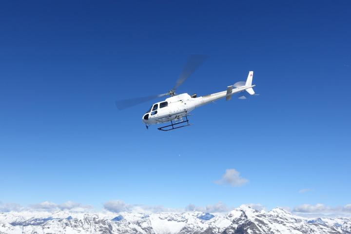 Our helicopter tour will bring you over the white mountains