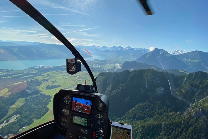 The view out to the helicopter cockpit to the Swiss Mountain is fantastic