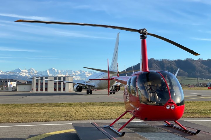 Our helicopter with the view to the Swiss Alps