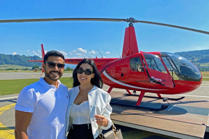 This couple is having fun on the helicopter tour by FunFlights