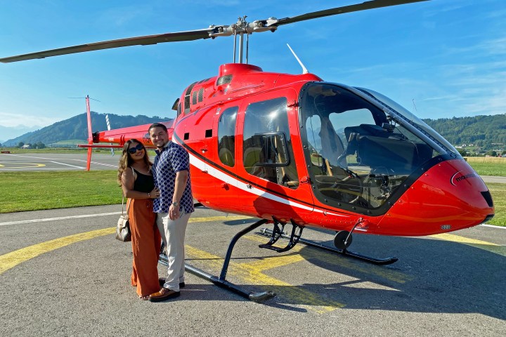 This couple is very happy after a great scenic flight to the Swiss Alps.