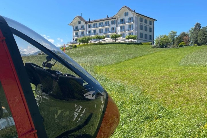 a car parked in a grassy field