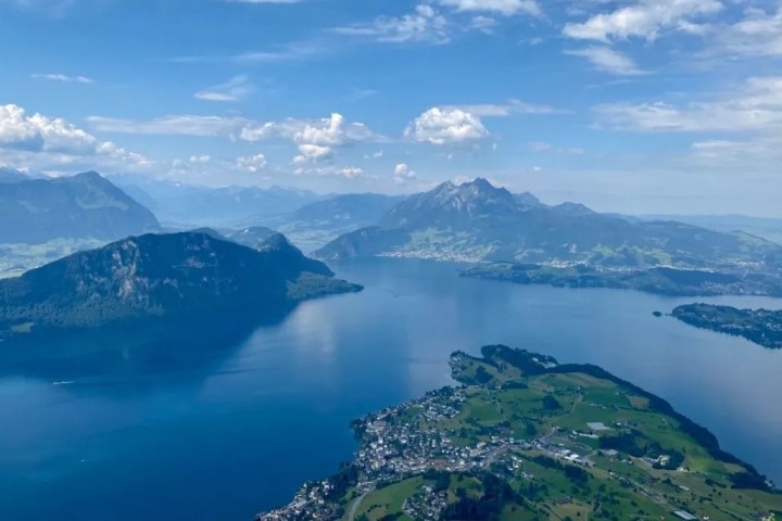 a view of water and a mountain in the background