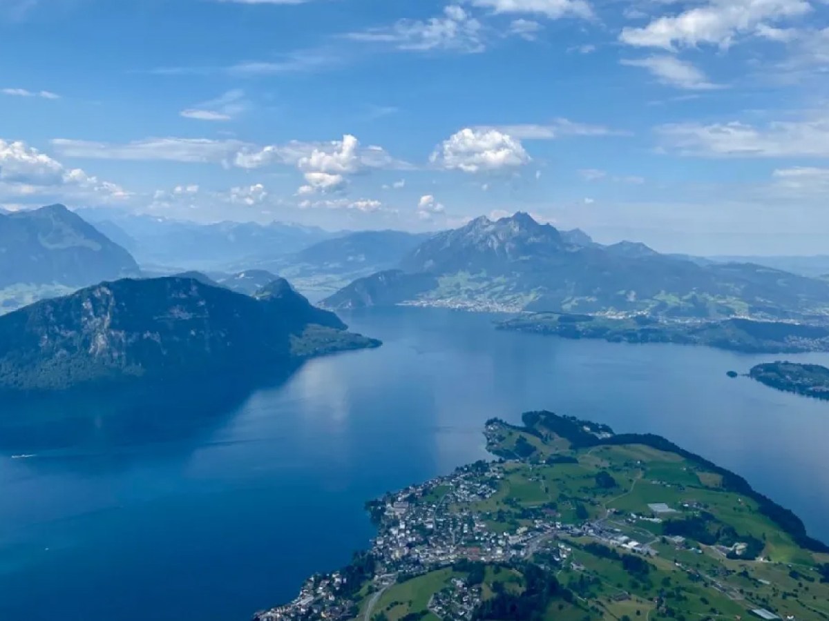 a view of water and a mountain in the background