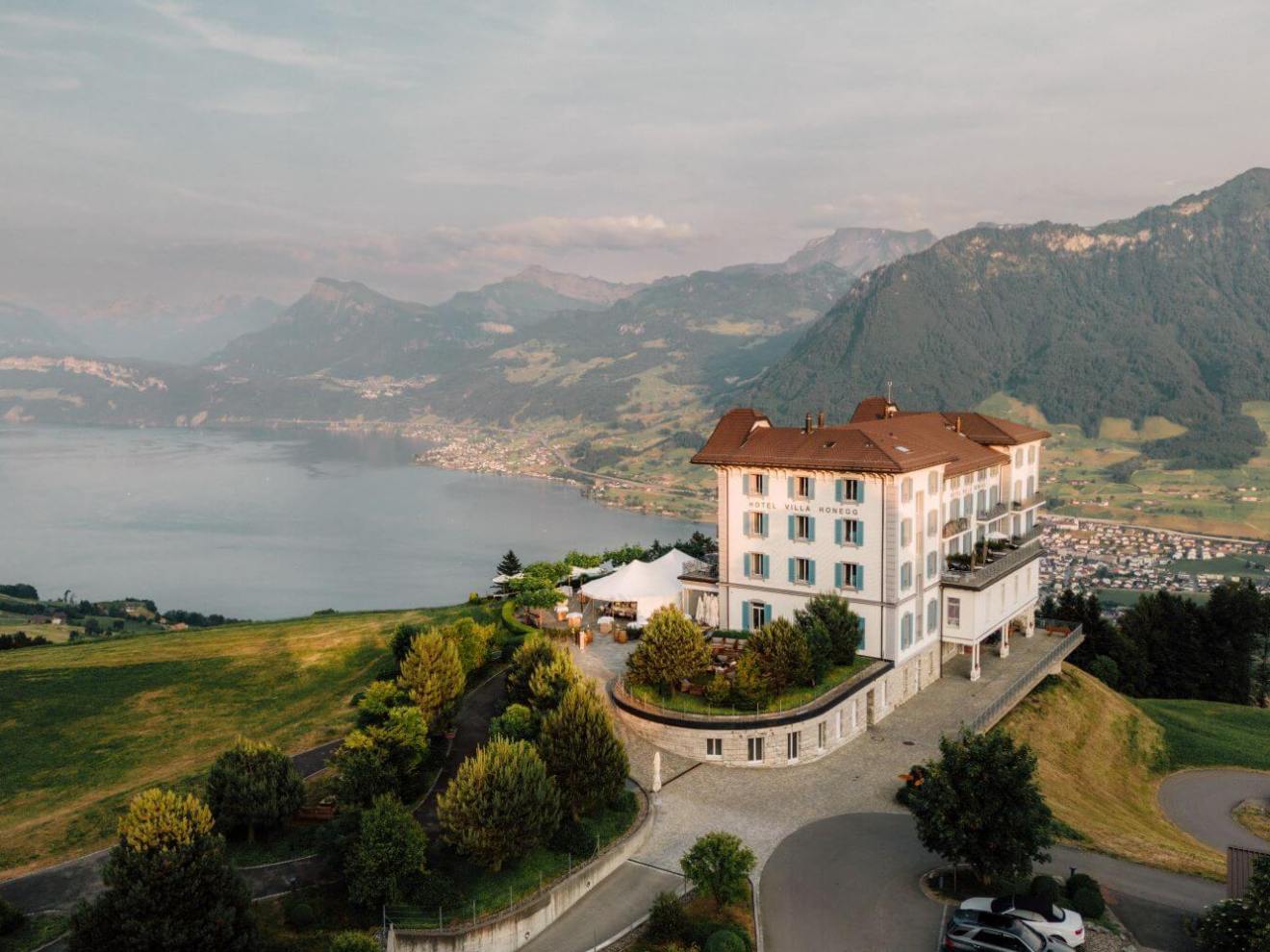a view of a house with a mountain in the background