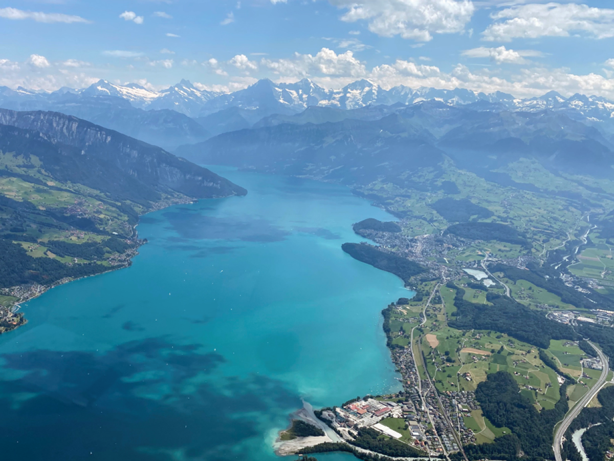 a view of water and a mountain in the background