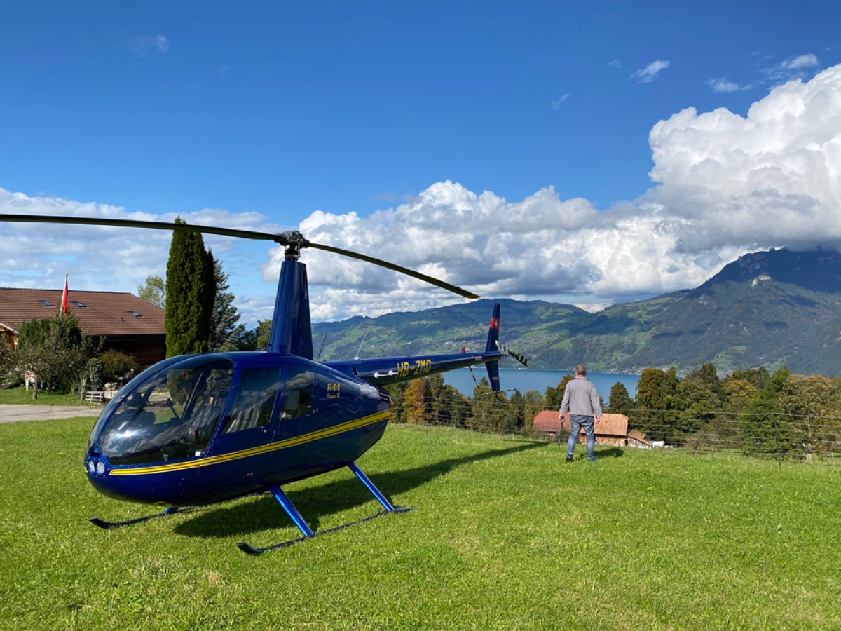 a plane sitting on top of a grass covered field