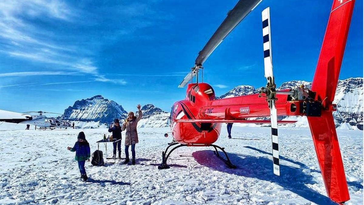 a group of people skiing on the snow