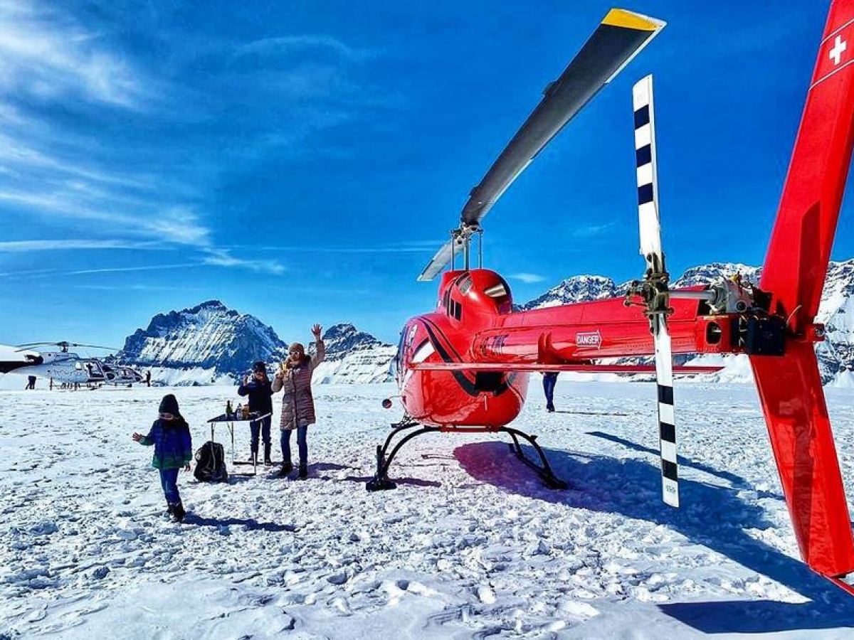 a group of people skiing on the snow