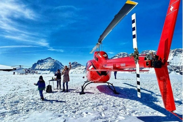 a person flying through the air while riding skis
