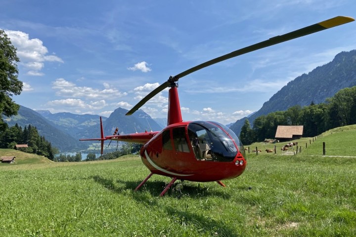 a plane sitting on top of a grass covered field