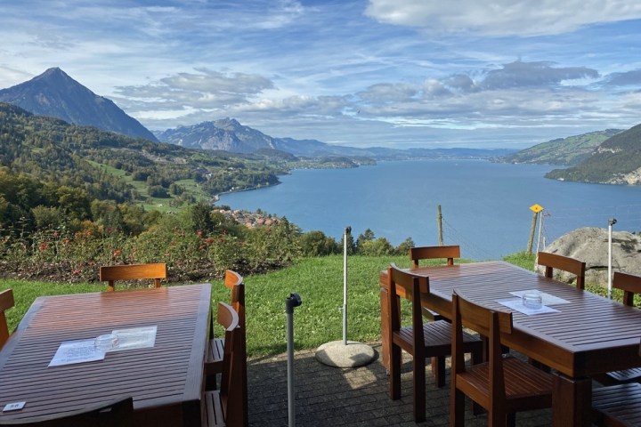 a chair sitting in front of a mountain