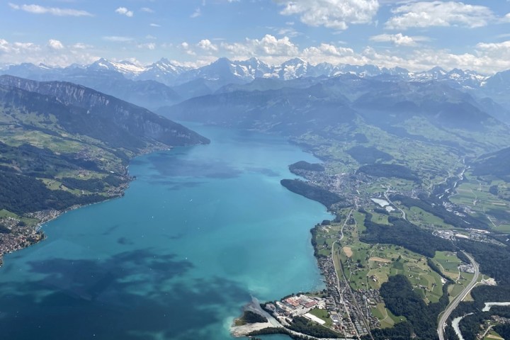 a view of water and a mountain in the background