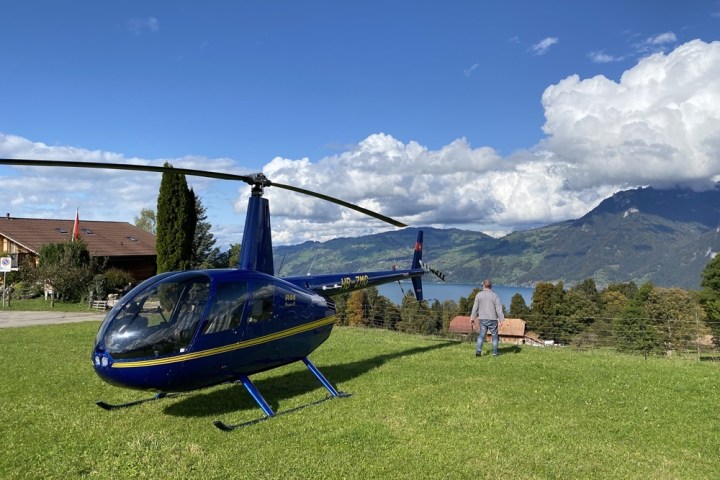 a plane sitting on top of a grass covered field