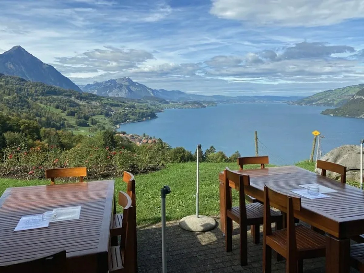 a chair sitting in front of a mountain