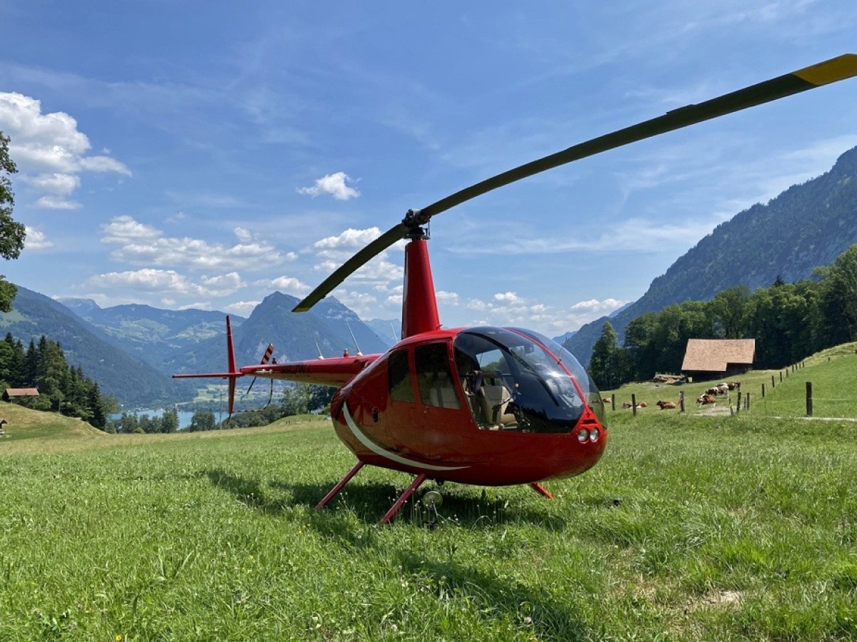 a plane sitting on top of a grass covered field
