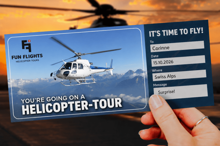 Woman holding a FunFlights helicopter gift voucher for a scenic helicopter tour over the Swiss Alps with a helicopter flying at sunset in the background.